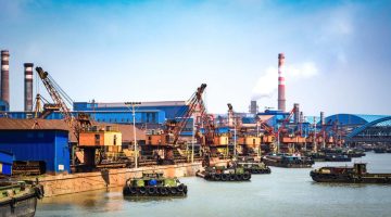 petroleum gas container ship and oil refinery background for energy nautical transportation
