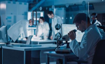 Shot,In,Industrial,Design,Research,Laboratory,,Specialist,Uses,Microscope,,Designer